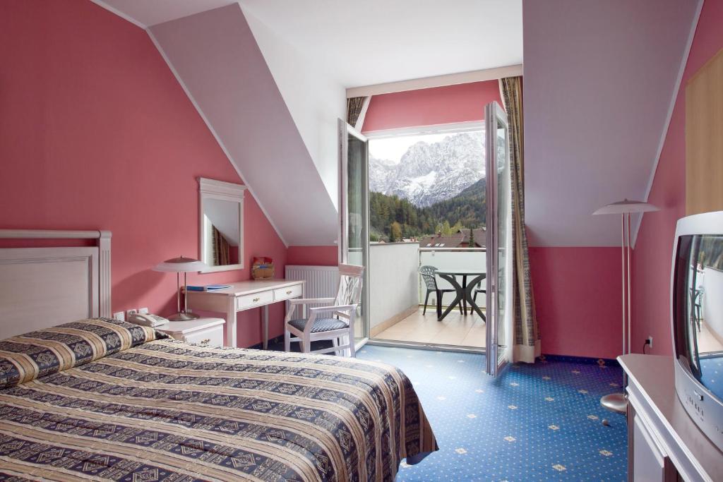 Ramada Hotel & Suites Краньска Гора Номер фото