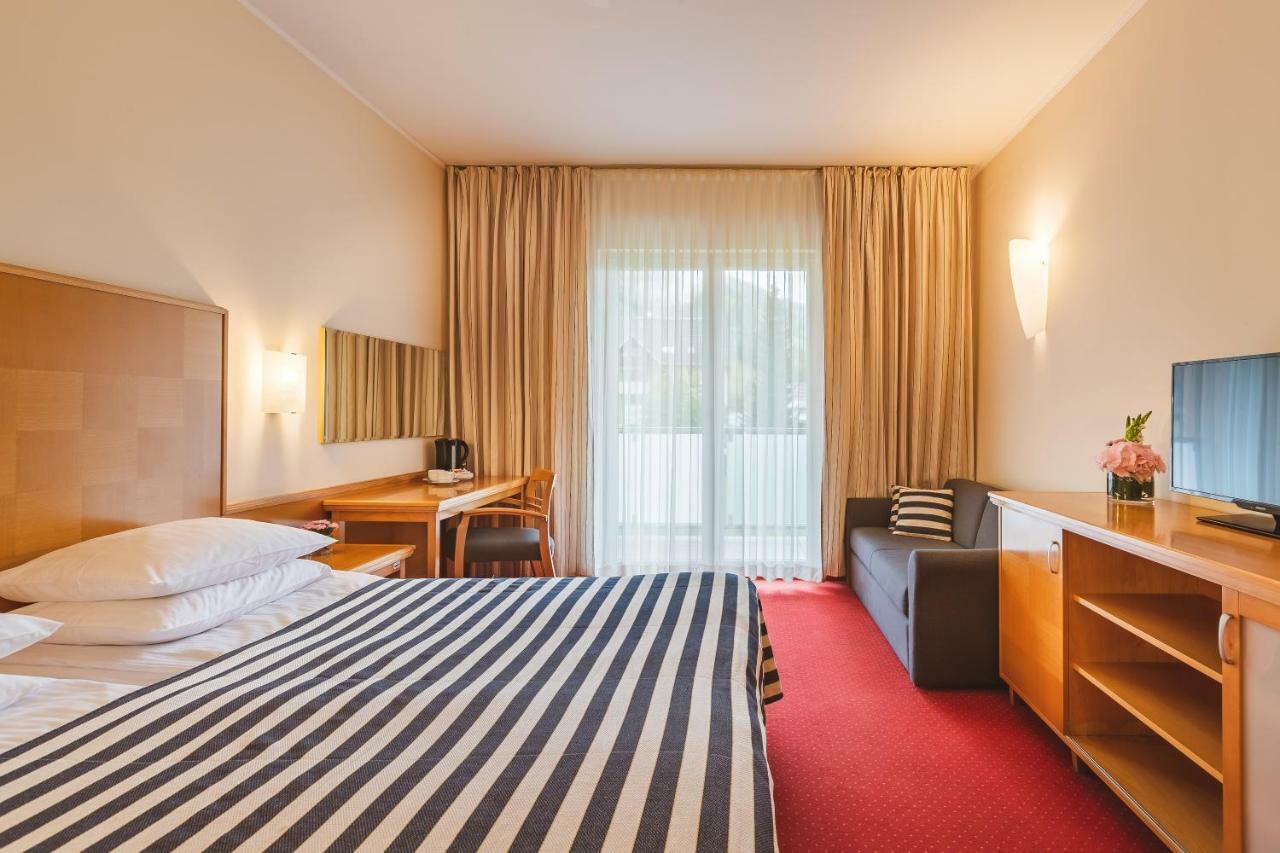 Ramada Hotel & Suites Краньска Гора Экстерьер фото